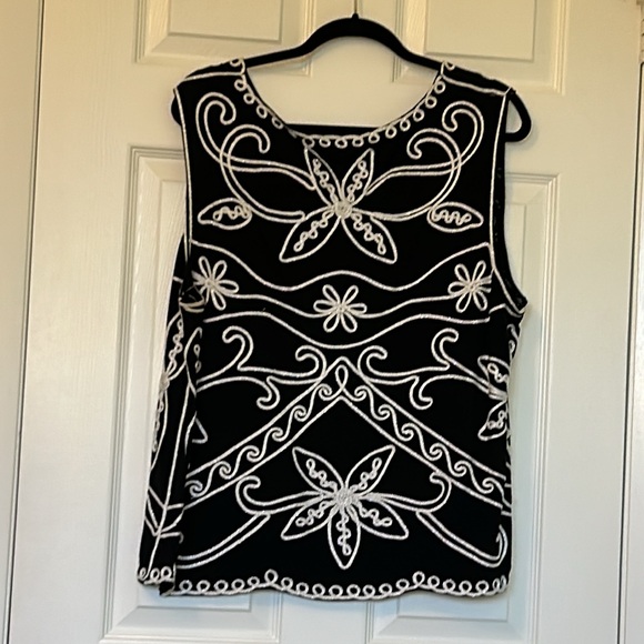 Sleeveless black top with white/silver sash trim on both front and back - Picture 2 of 2